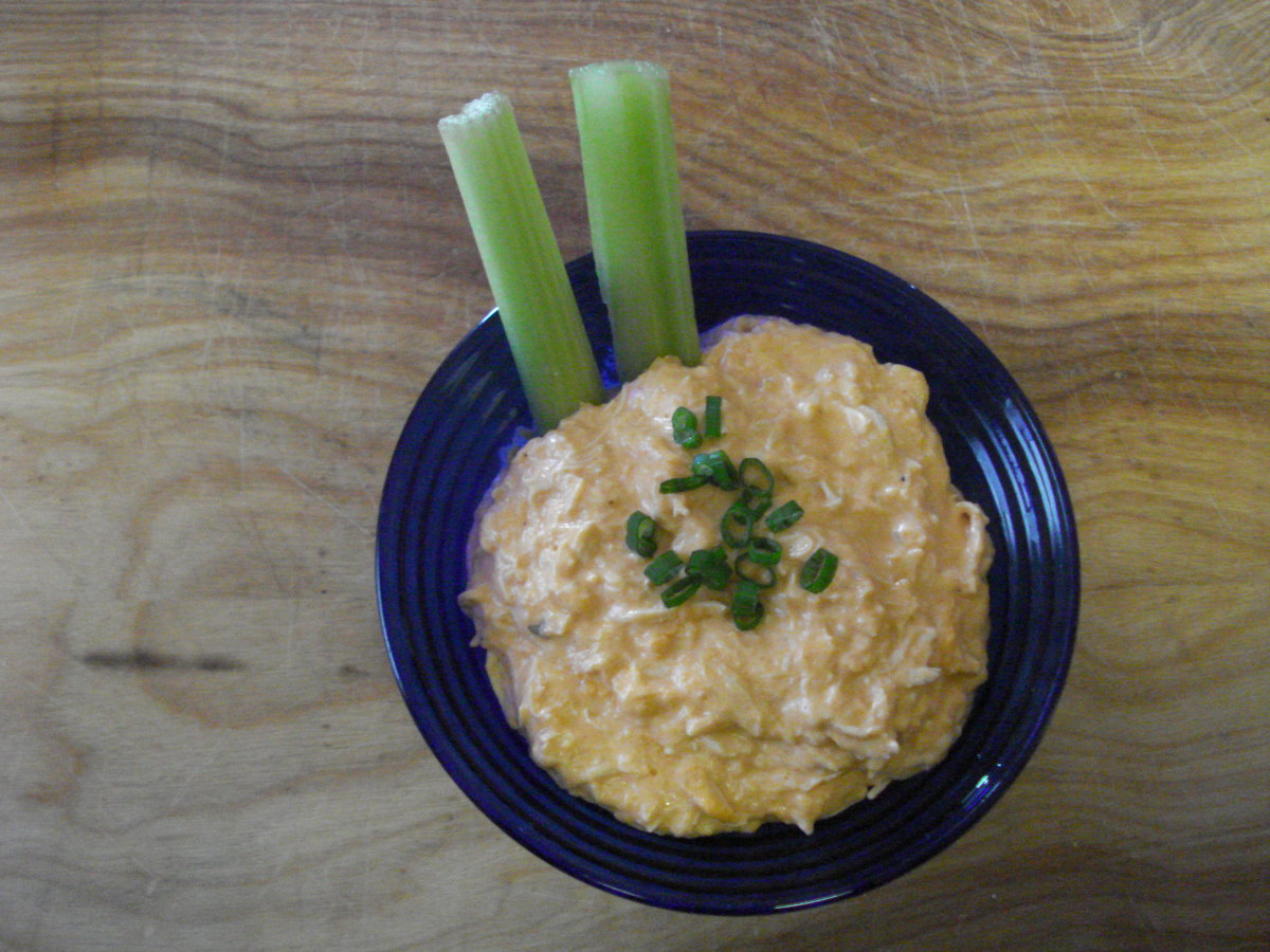 Buffalo chicken dip served with celery