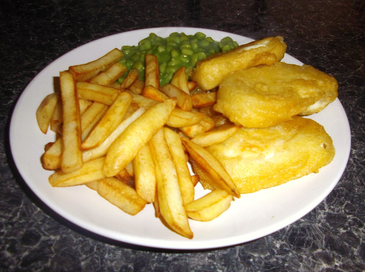 Battered halloumi cheese is a great vegetarian substitute for fish and chips. Here, it's served with mushy peas.