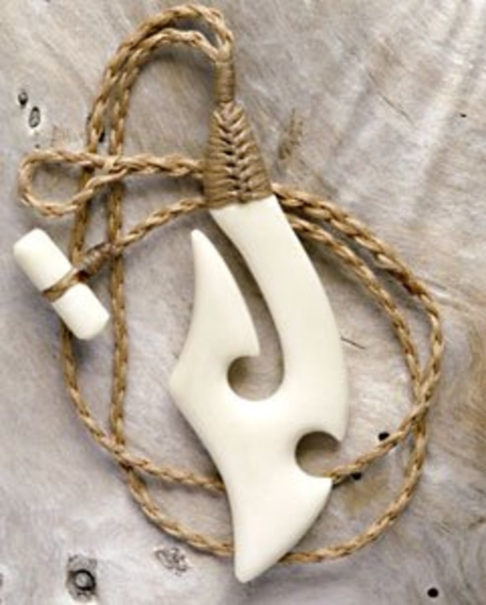Maori symbol necklace with traditional binding