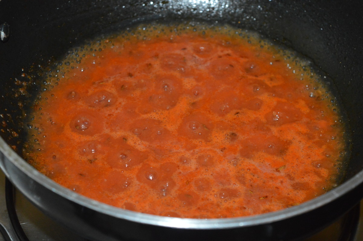 Add the tomato-ginger paste and some salt. Saute it until it becomes almost dry.