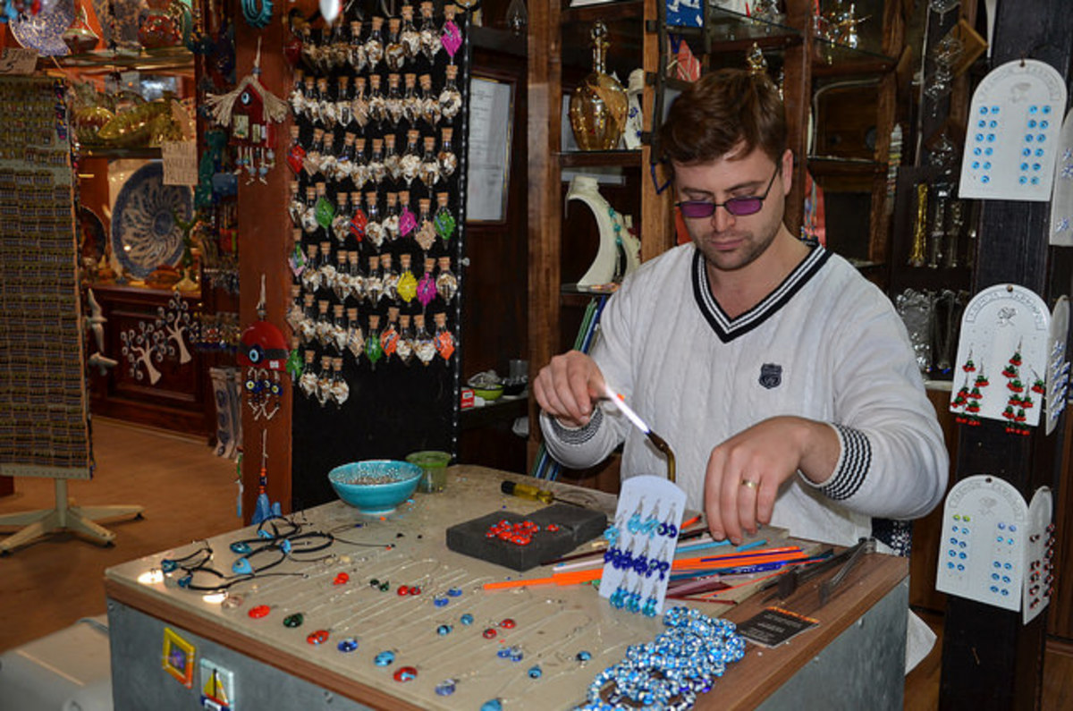 Shopkeeper selling Imitation Jewelry