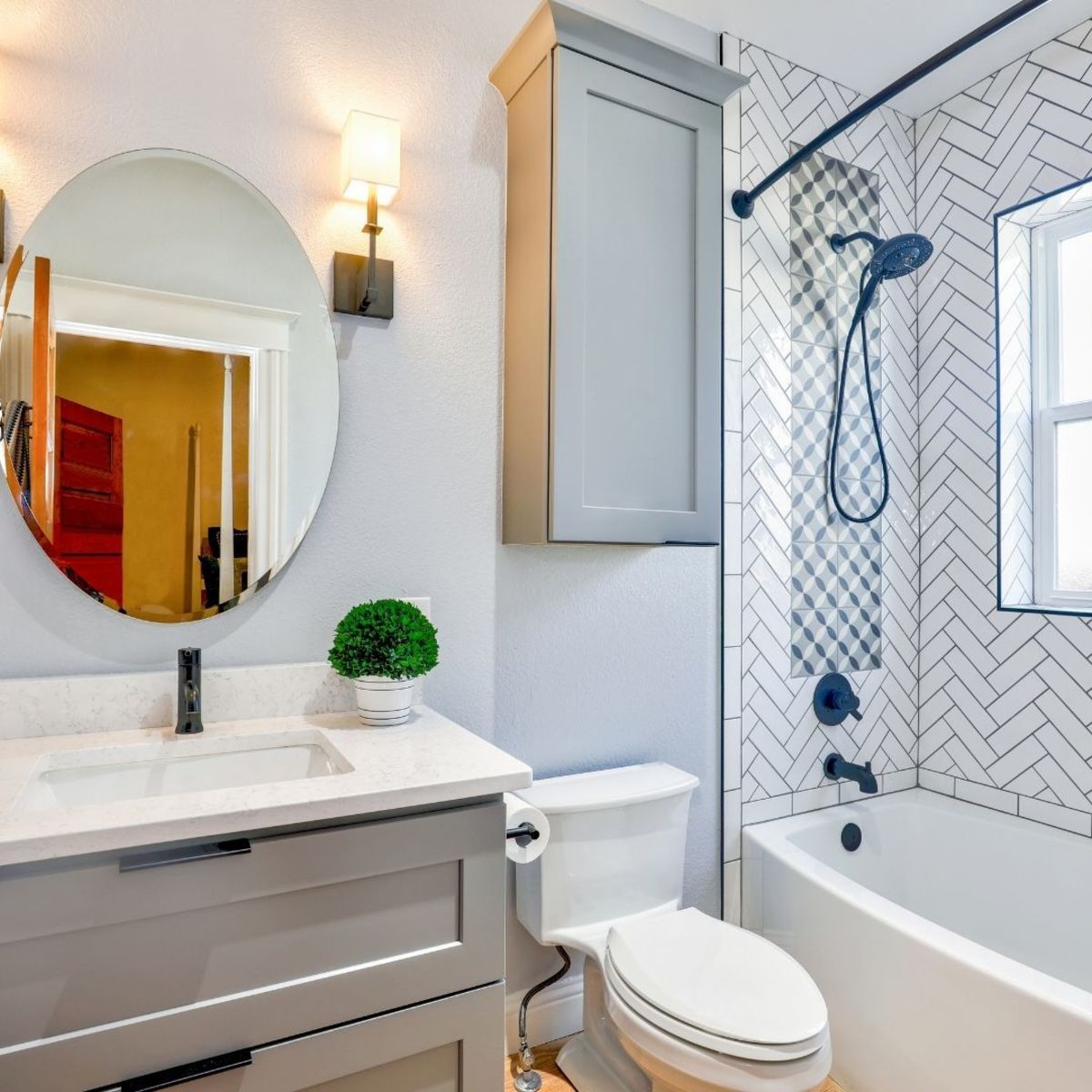 Small bathrooms create many challenges, but the most important one is not cluttering the space. Keep it clean, and introduce natural lights and good ventilation.