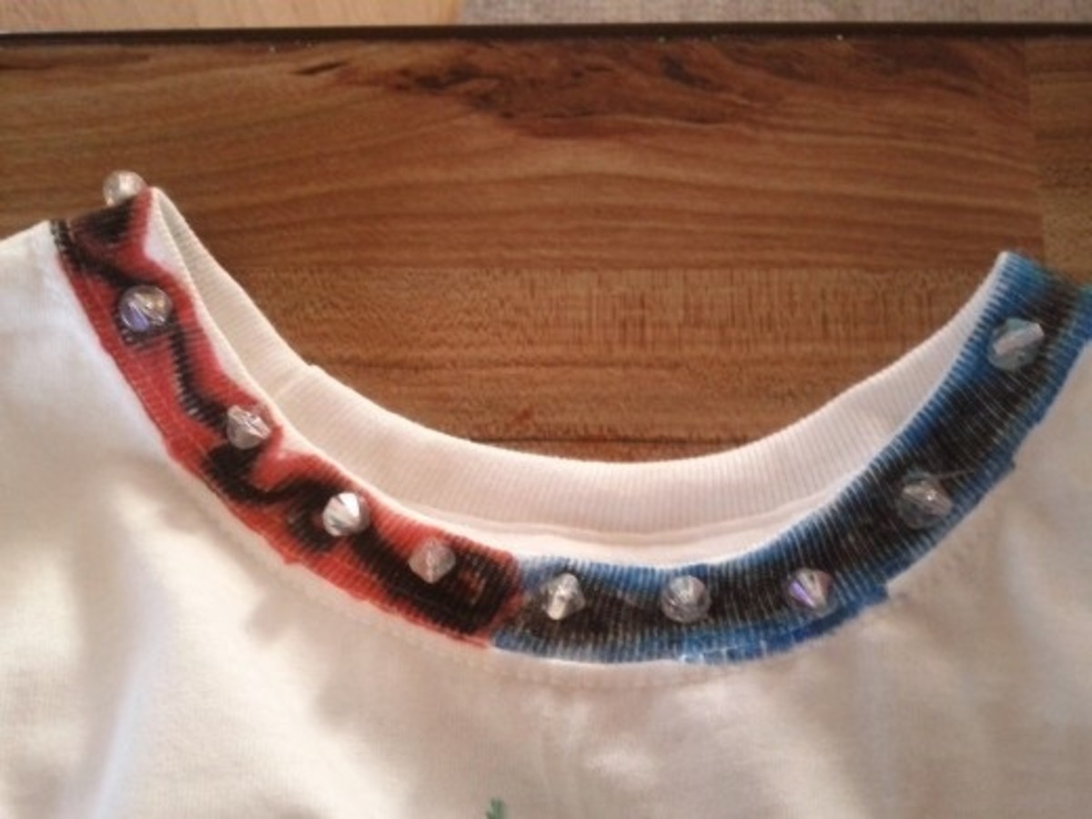If desired, embellish the collar and sleeve edges with fabric markers and beads. 