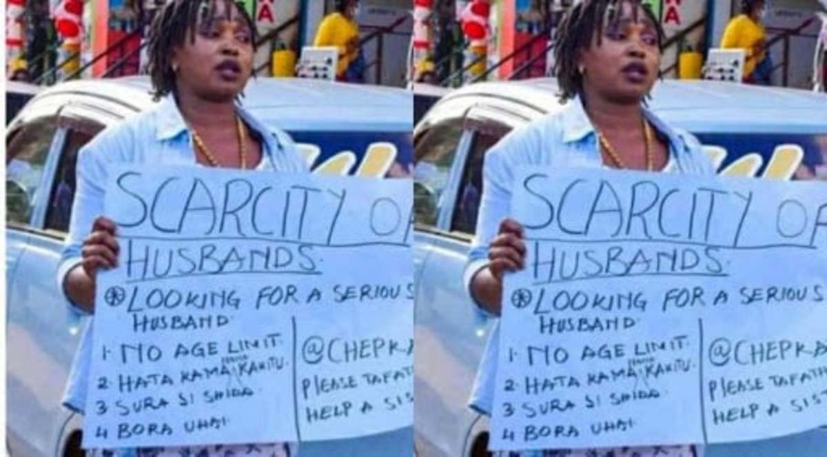 A Kenyan woman searching for a husband using a placard