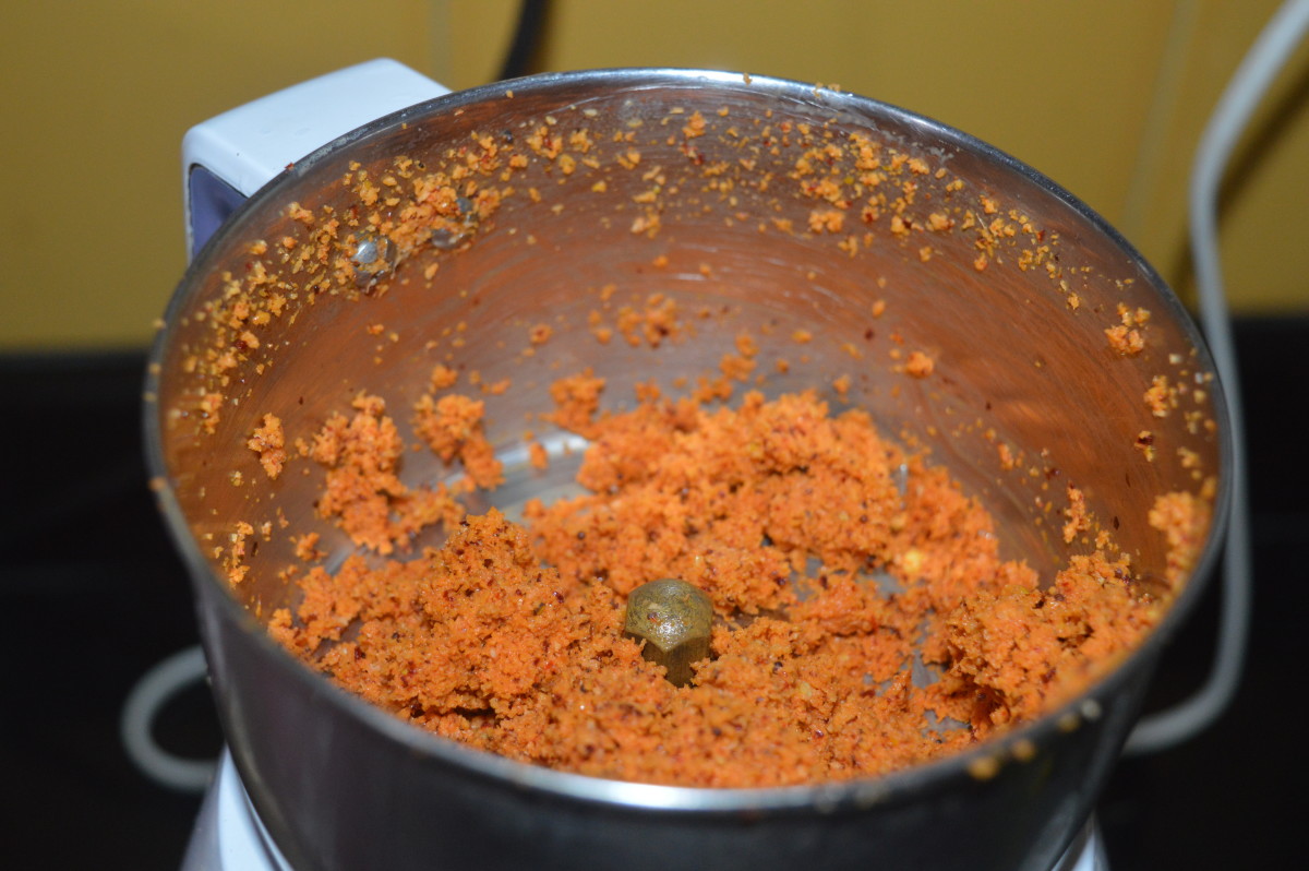 Step three: Grind grated coconut, mustard seeds, and broken dry red chilies without adding water. Set aside.