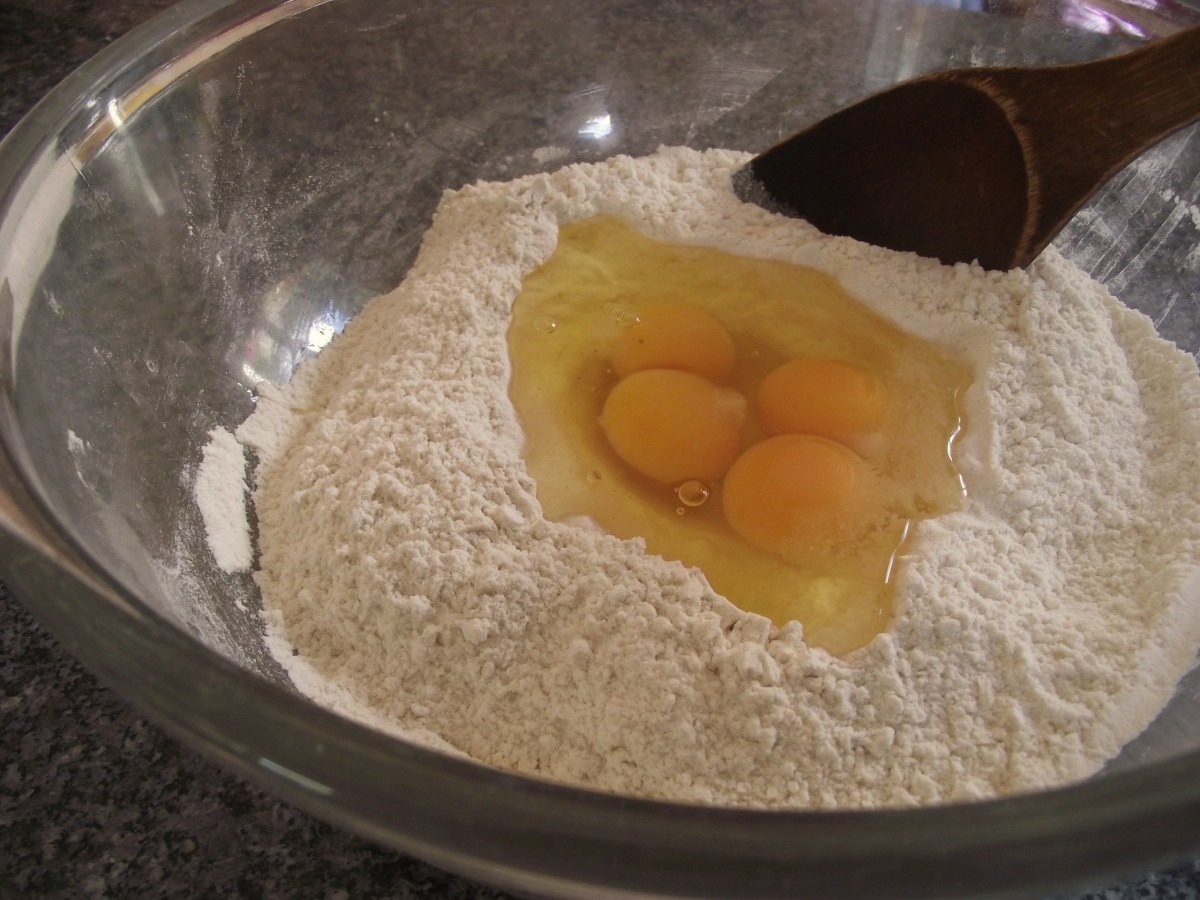 Create a hollow in the centre of the flour and crack in 2 eggs,