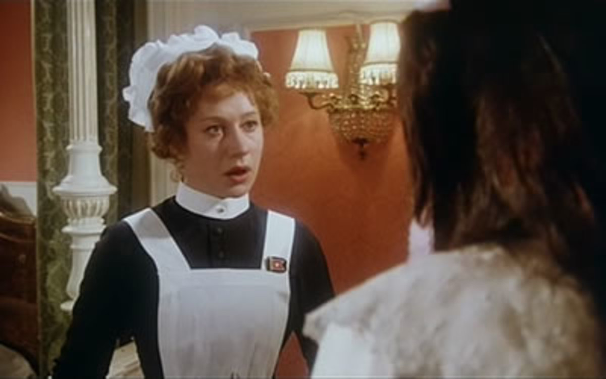 Stewardess May Sloan (Helen Mirren) is confronted by Madeline Astor (Beverly Ross) after she catches her touching her dress
