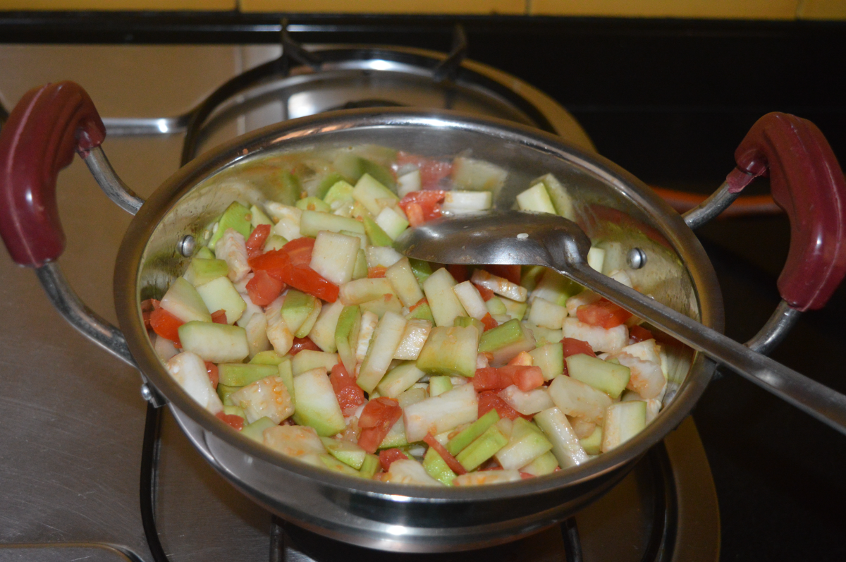 Increase the heat and saute until the bottle gourd gets cooked. Sprinkle some water if needed.
