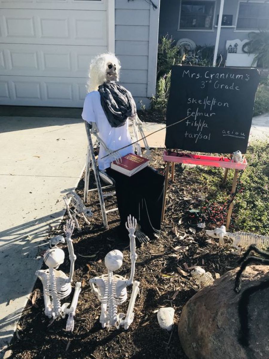 Skeleton children need their education, too. Posing skeletons in ordinary situations like this is a sure to get a laugh.