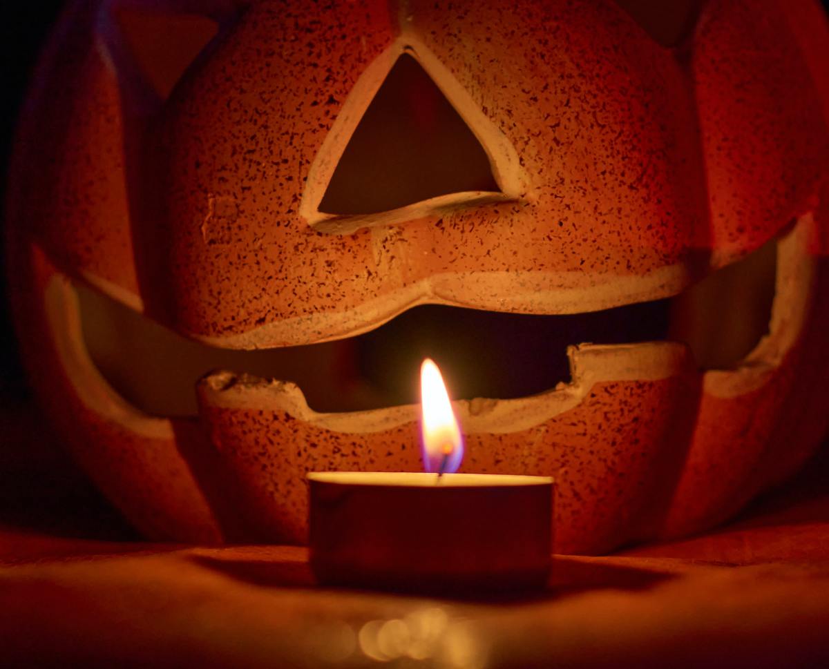 When you cut from the bottom, you can simply place your pumpkin over the lit candle instead of trying to light the candle from above. No more burns!