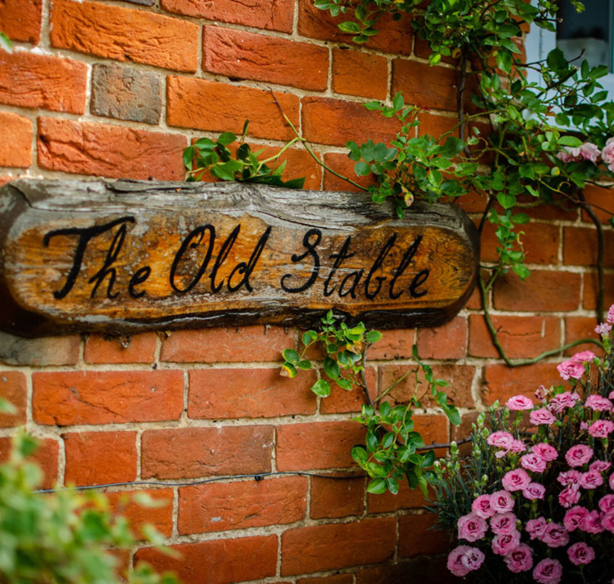A house sign inspired from an old horse stable.