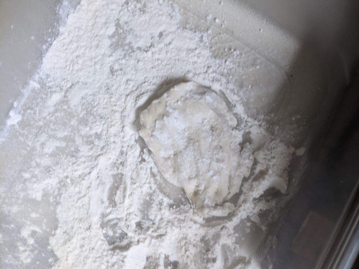 Flatten dough on flour.