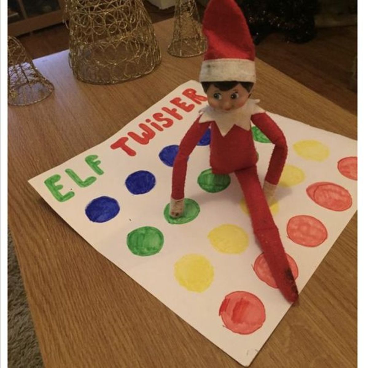 Elf challenges you to a game of Twister. 
