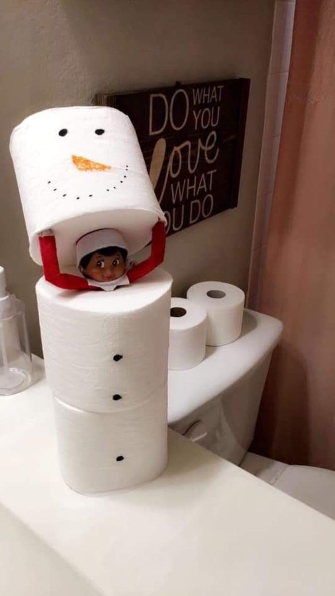 This elf uses TP to pose as a snowman.
