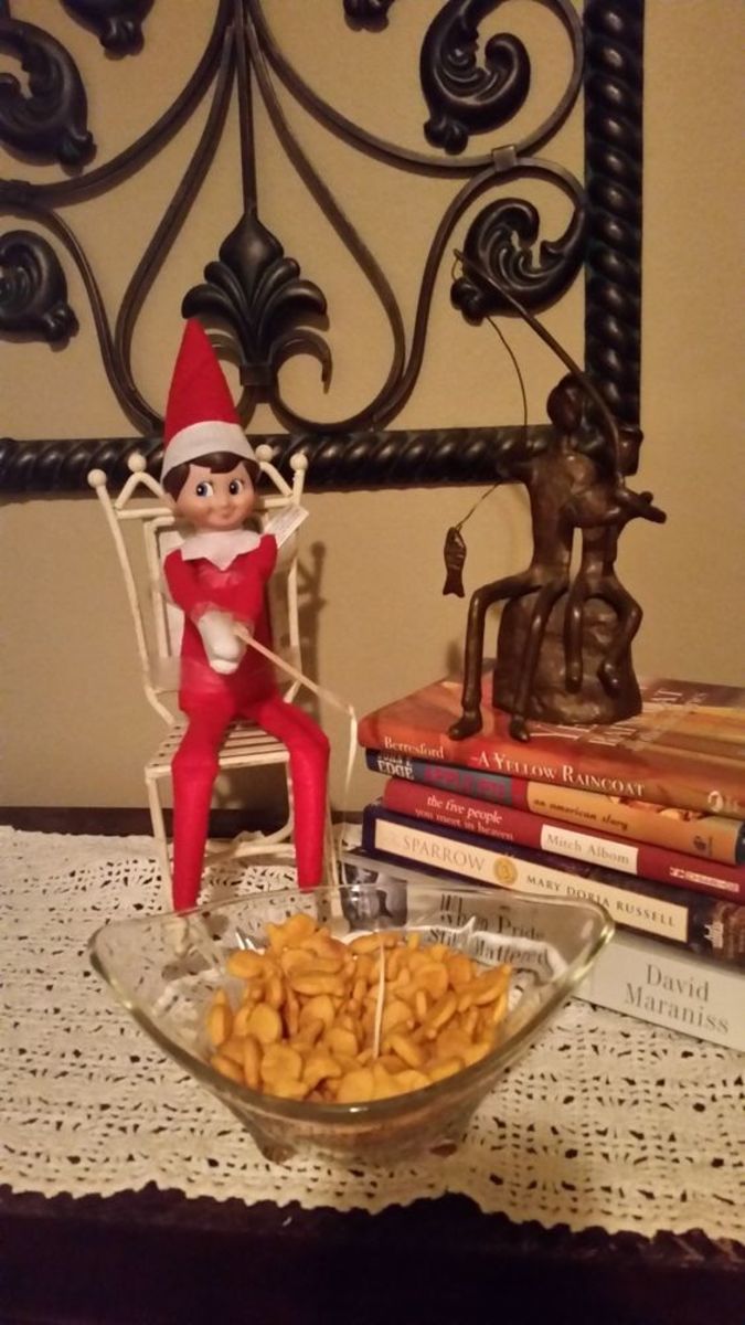 Elf fishing for crackers.
