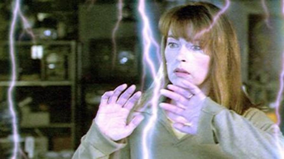 Dr. Valery Landis (Joanna Pacula) seems to enjoy playing with contained lightning