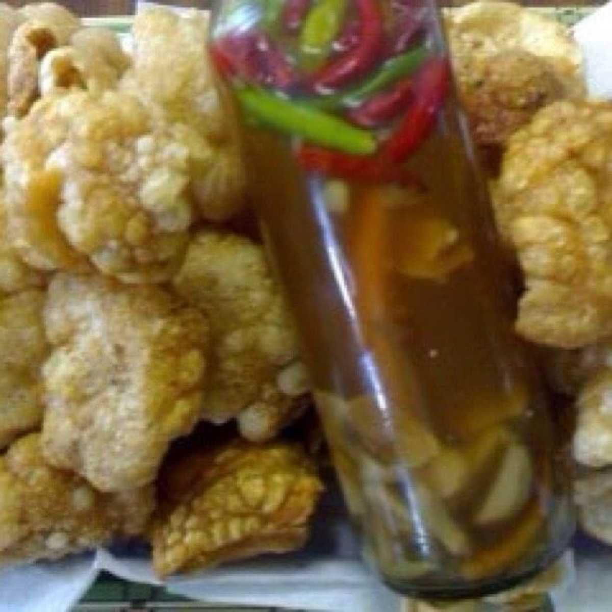 Chicharon with spiced-vinegar.