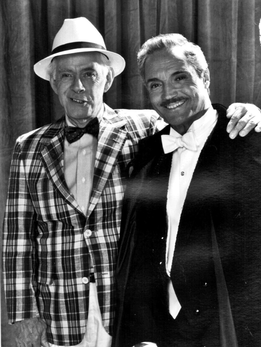 Harry Morgan (left) with Hal Linden in a publicity pose for their series Blacke's Magic