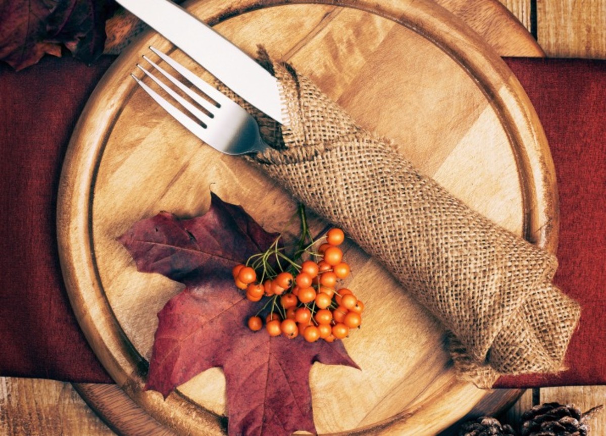 Wrap silverware in burlap and decorate with colorful fall leaves.