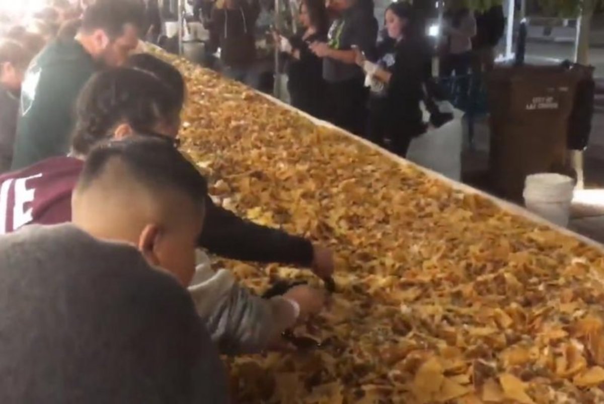 Nov. 12, 2018 New Mexico City builds a 5039 pound serving of Nacho passing the record last Guinness record holder of  a 4,689 pound Nacho held by the University of Kansas.