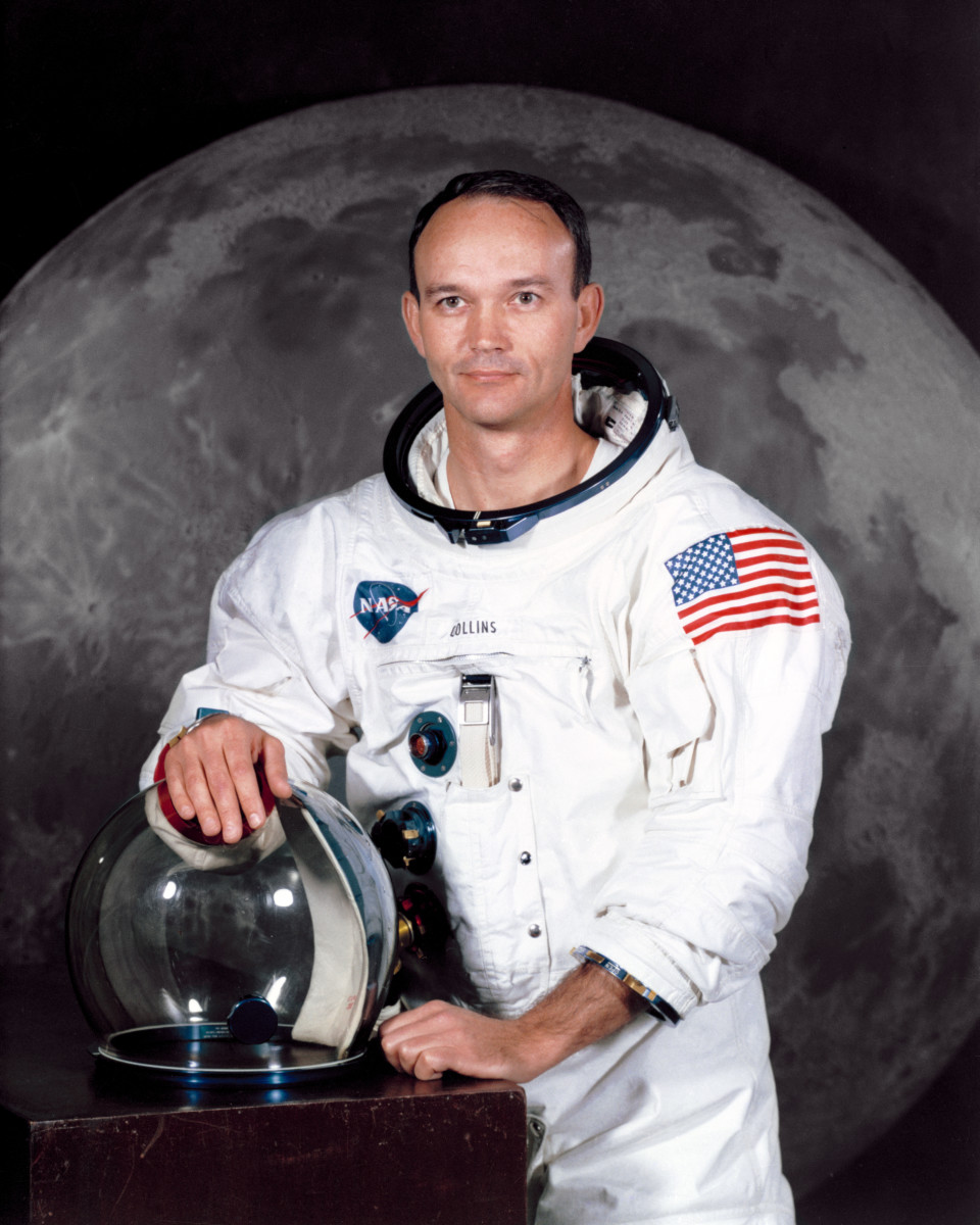 A portrait of Michael Collins in his NASA spacesuit