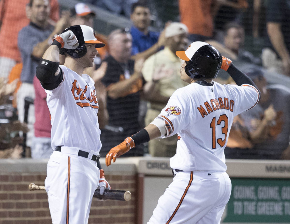 Chris Davis (left) and Manny Machado delighted Baltimore with prodigious power and are two of the top home run hitters in franchise history.