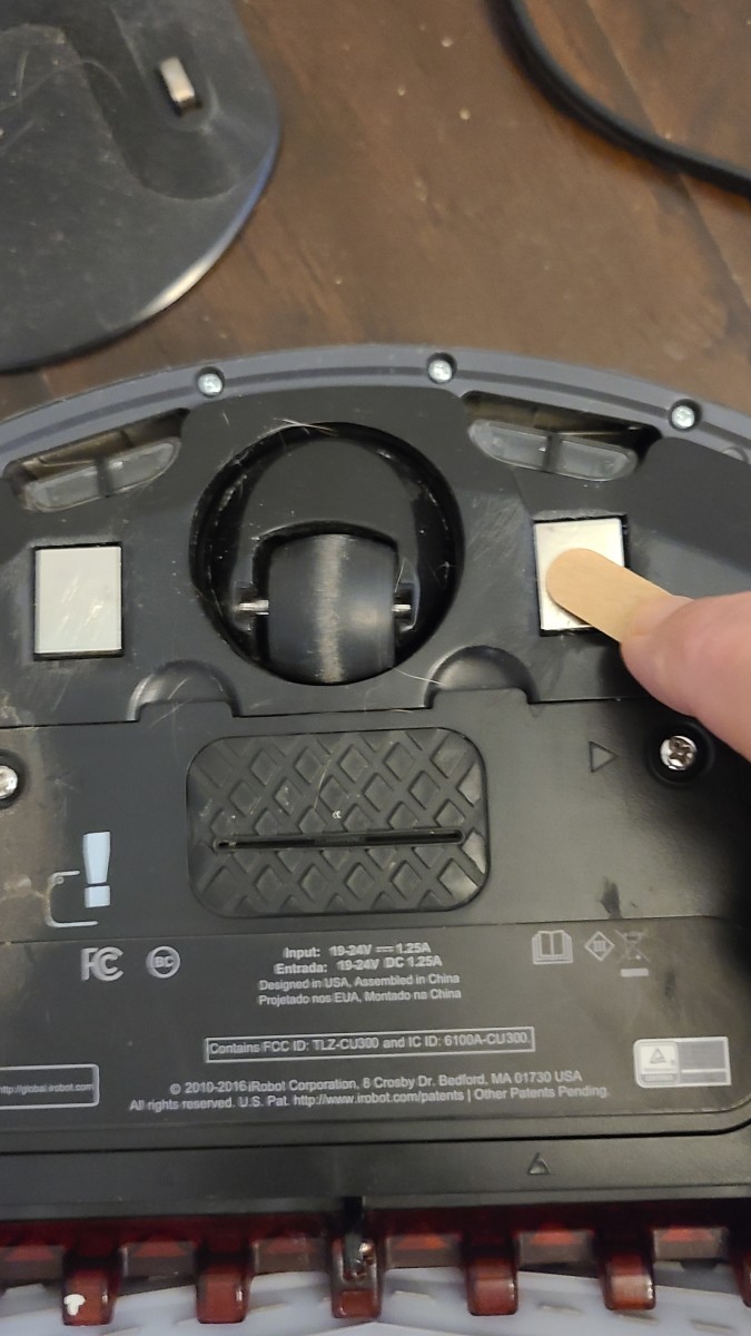 In cases where there is severe buildup of dirt and corrosion, you may need to use an emergy board to clean your Roomba's charging contacts. 