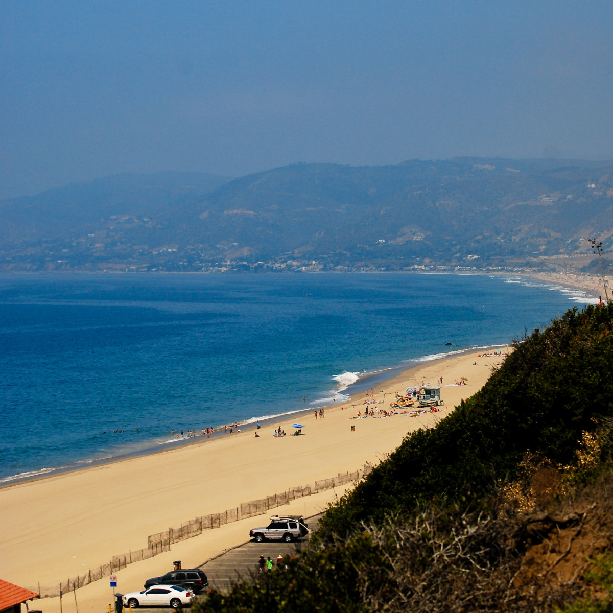 Long shot of Zuma Beach from adjacent and smaller Pt. Dume State Beach on the west.