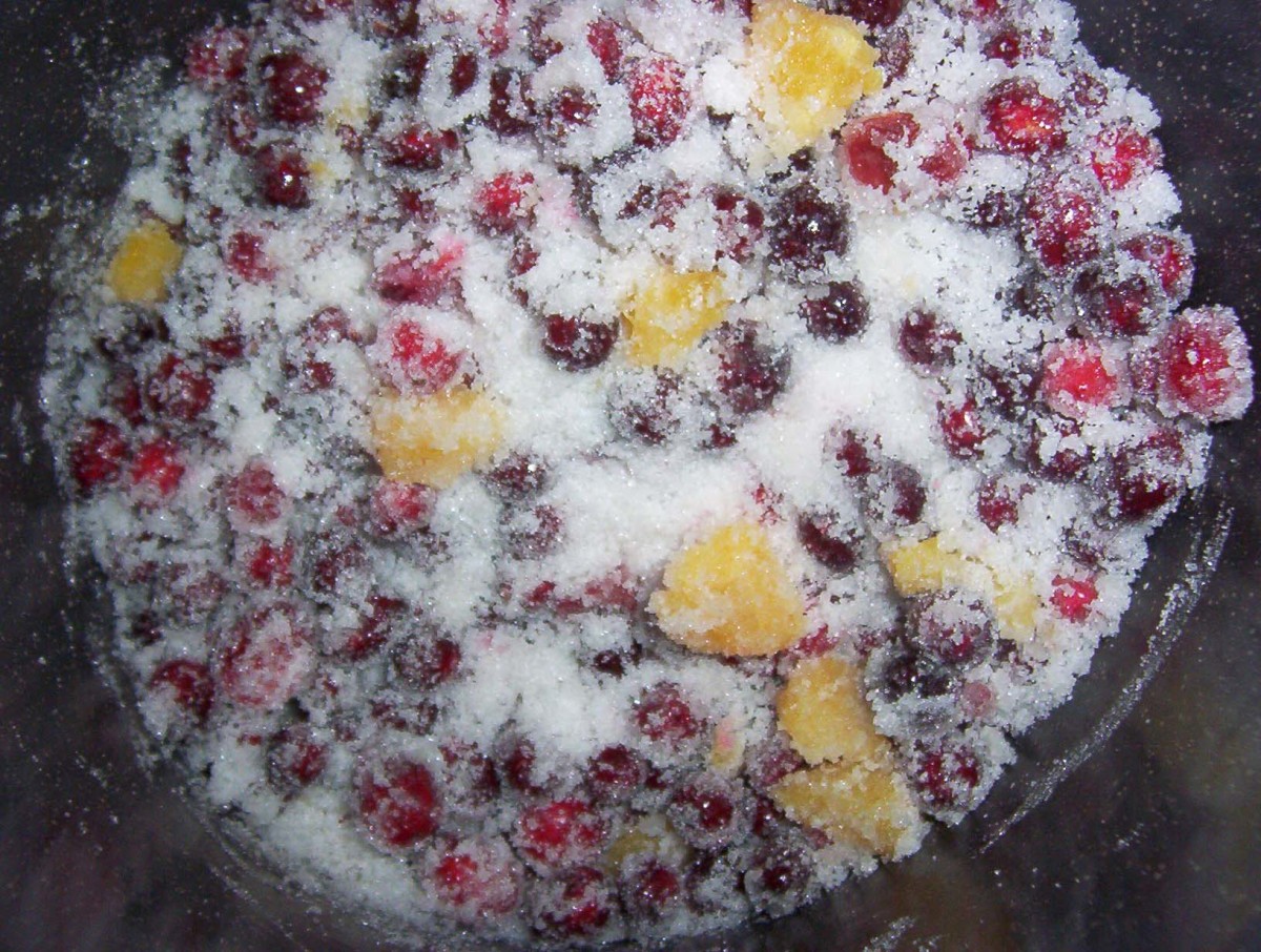 Cranberries, citrus, and sugar mixed