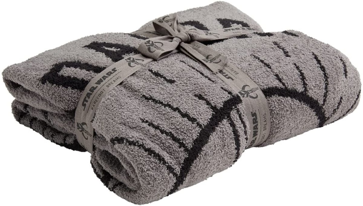 A Mandalorian blanket soft as can be, all wrapped up for you from CozyChic