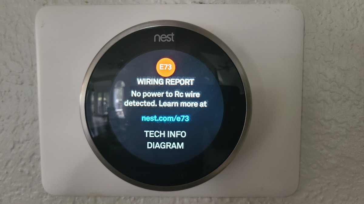 The Nest display reporting the "no power to RC wire" issue.
