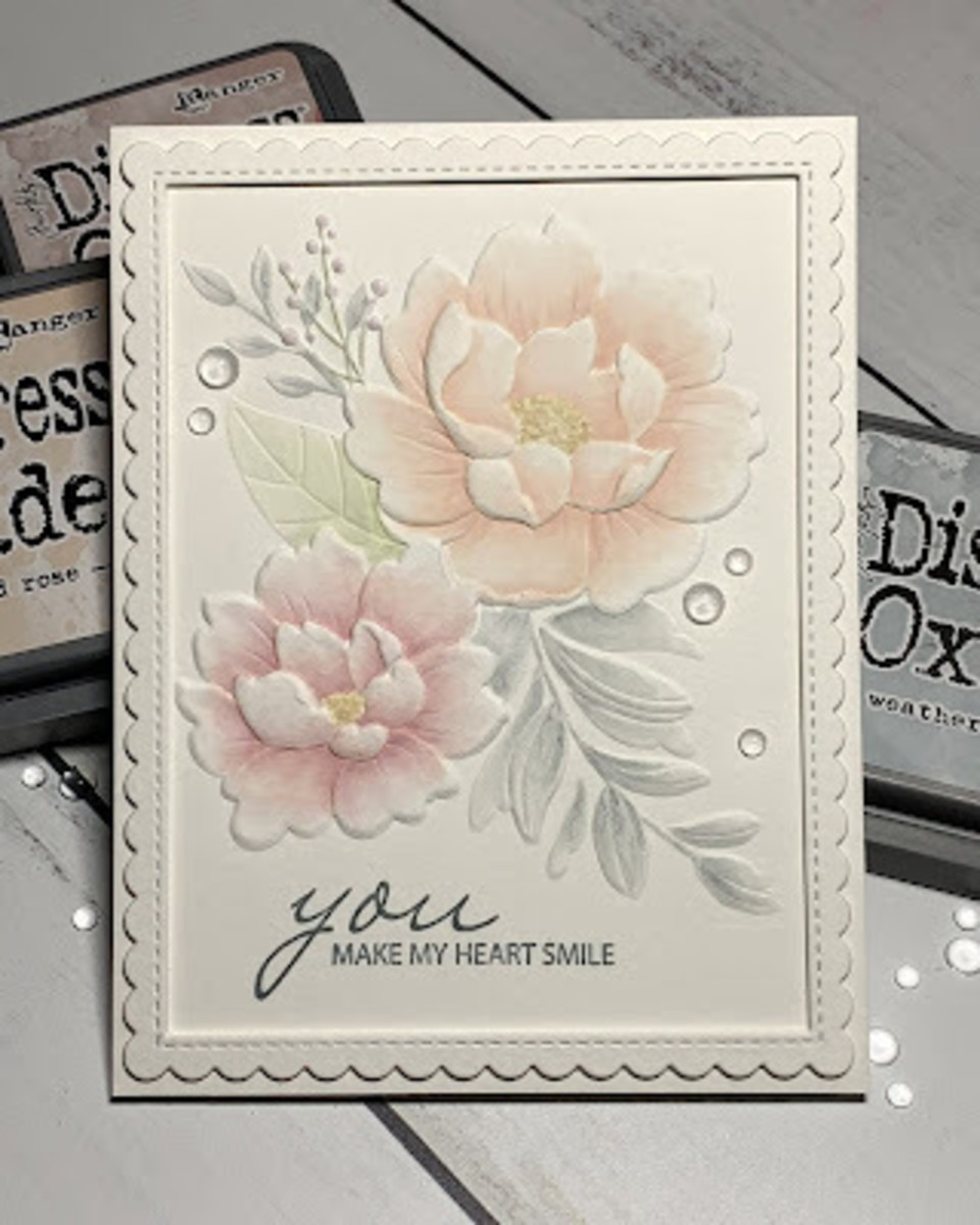 You can use distress oxide inks to color 3D  embossing folders. Learn more