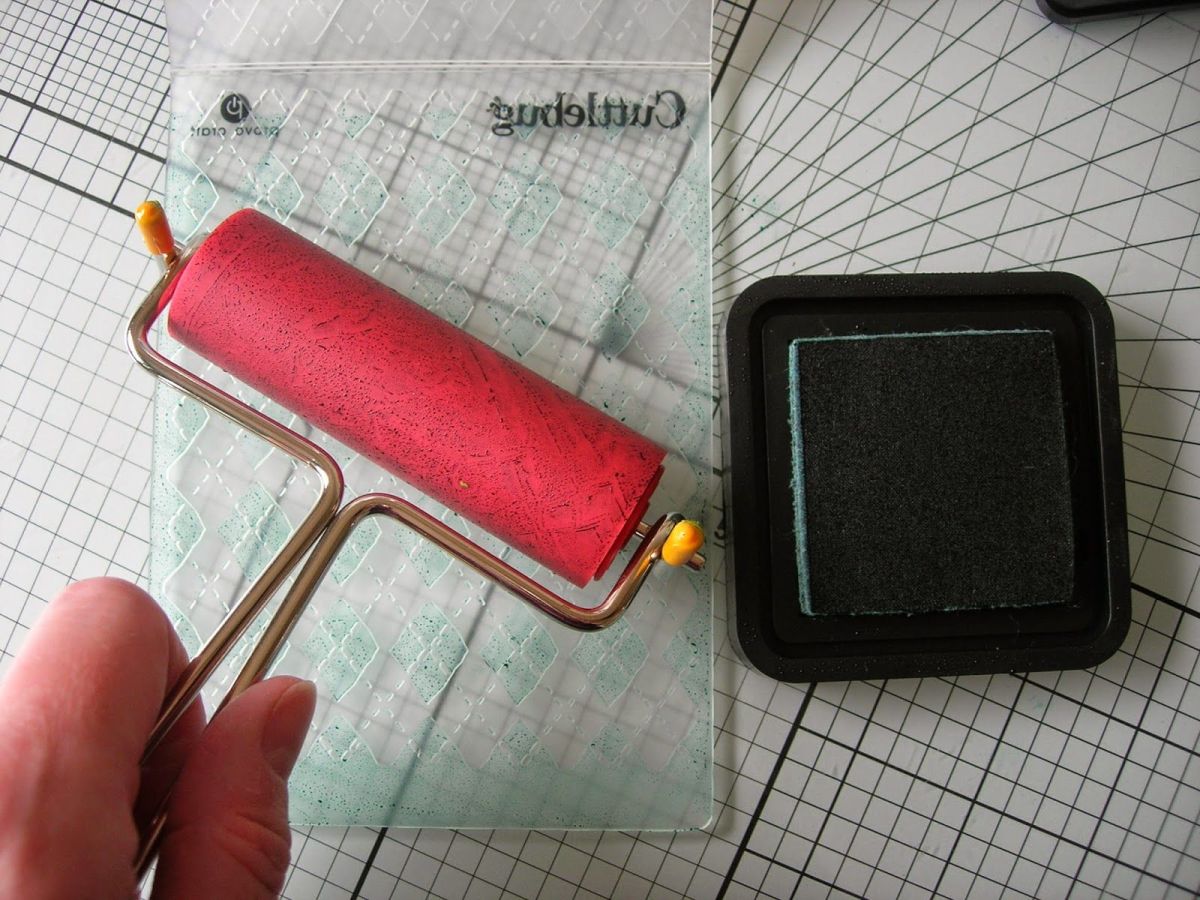 Using a brayer is a method of applying ink to an embossing folder