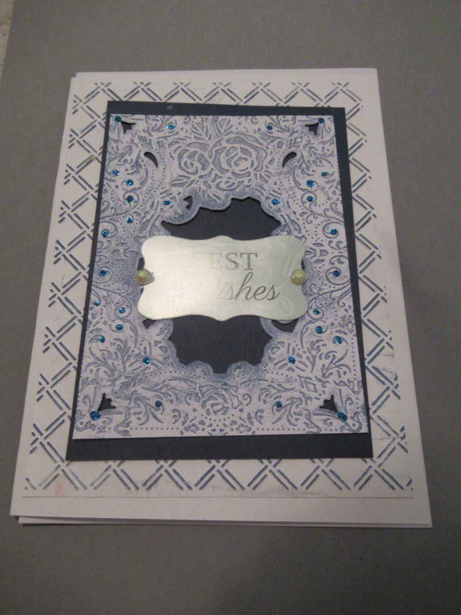 You can layer two ink embossed layers on one card