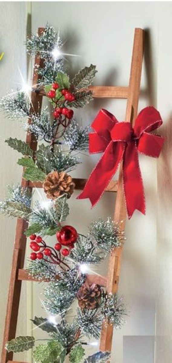 Simple Ladder With Flocked Greenery and Red Bow