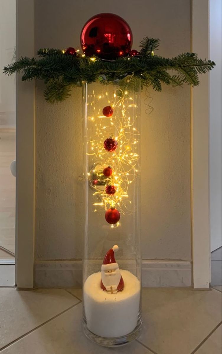 Tall Vase Filled With Fake Snow, Santa and Fairy Lights