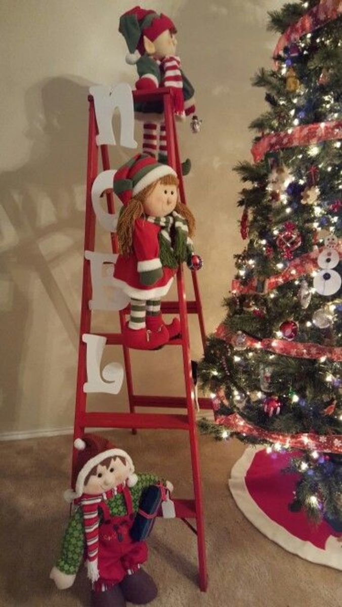 Red Ladder With Christmas Elves and "Noel" Sign