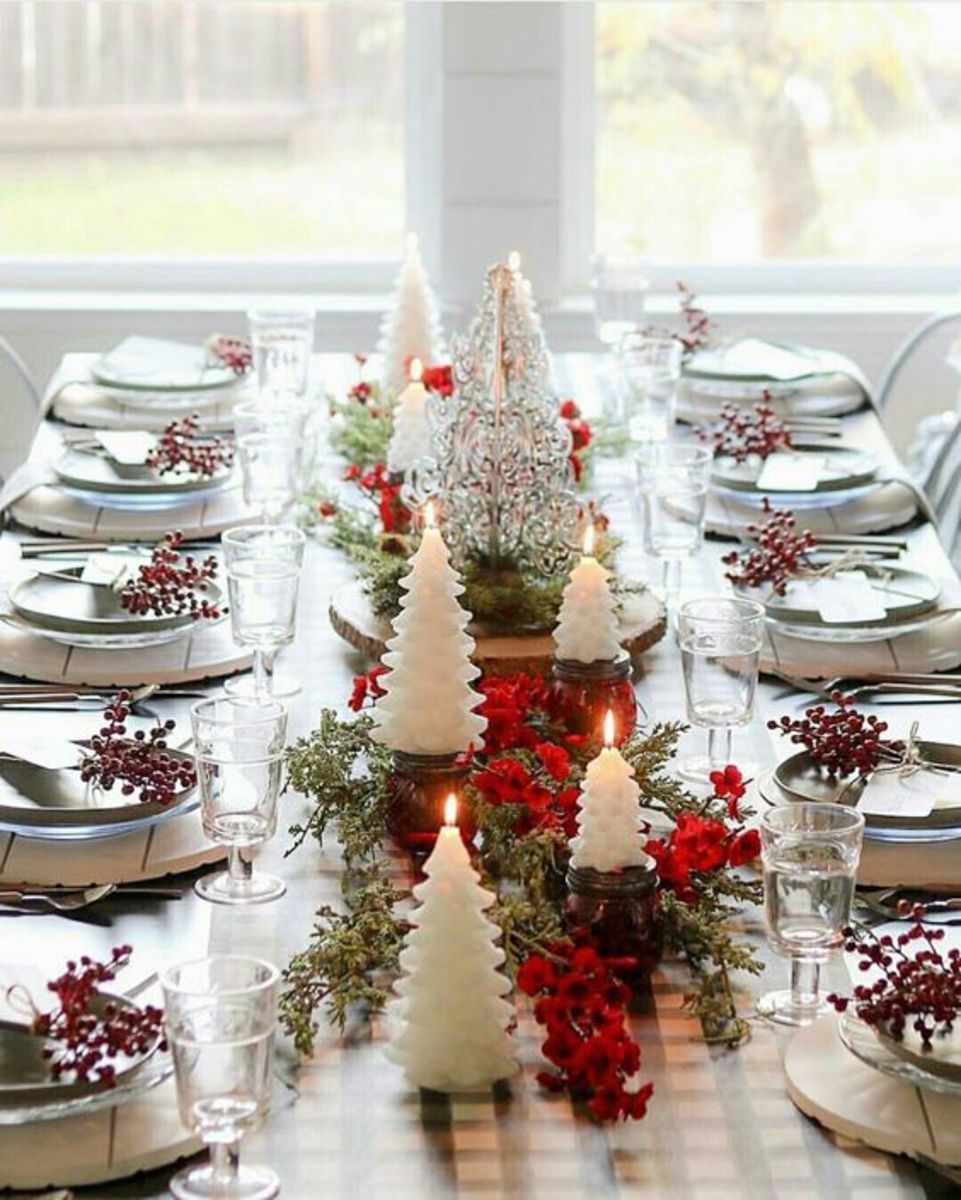 This bright table setting makes use of tree-shaped candles, faux berry sprays and a plaid tablecloth.