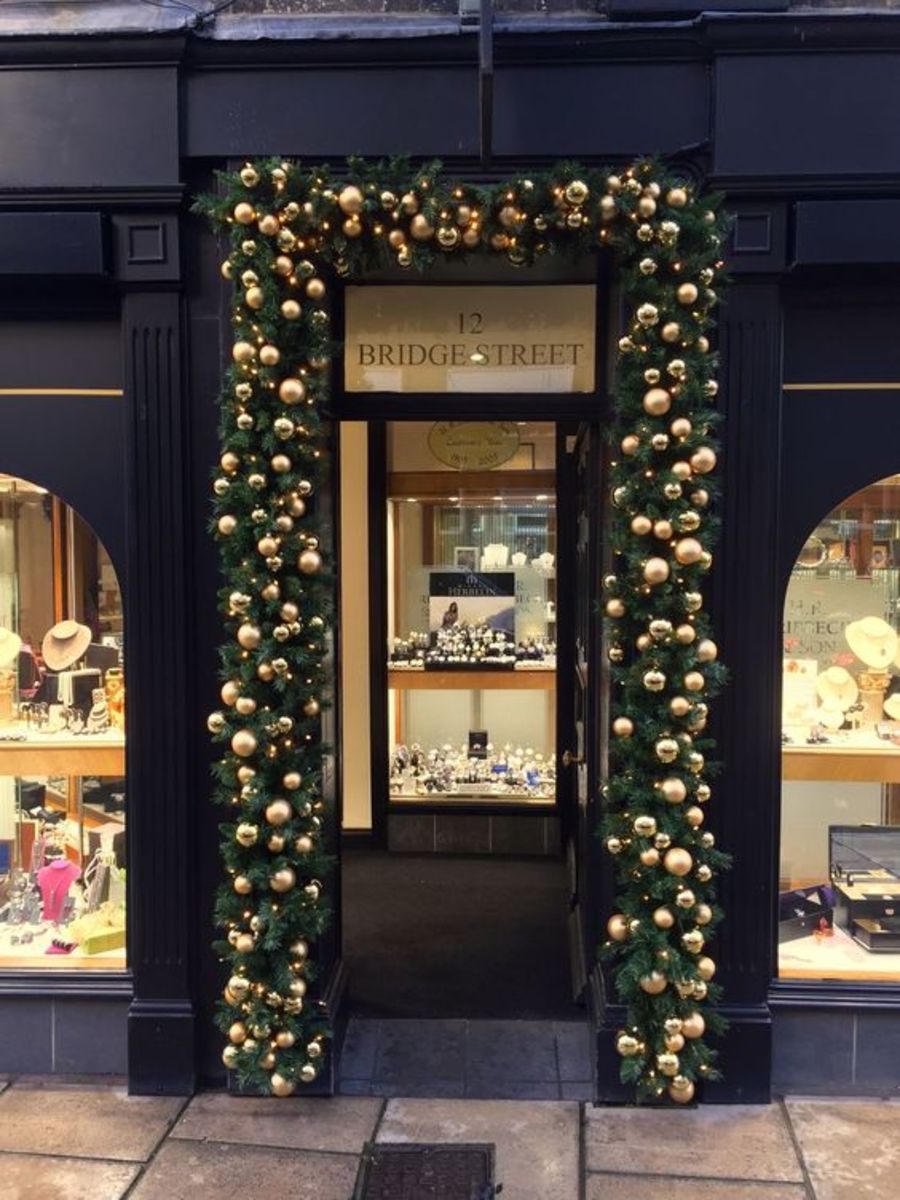 Okay, this one is NOT a DIY window, but you could recreate this store's ornament-bedecked swag at home on a smaller scale!