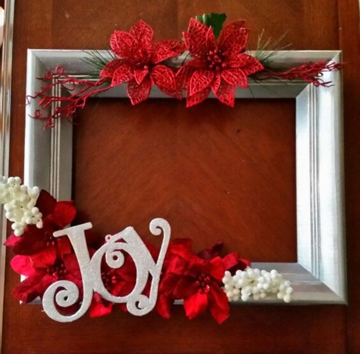 Silver "Joy" Picture Frame Wreath With Poinsettias