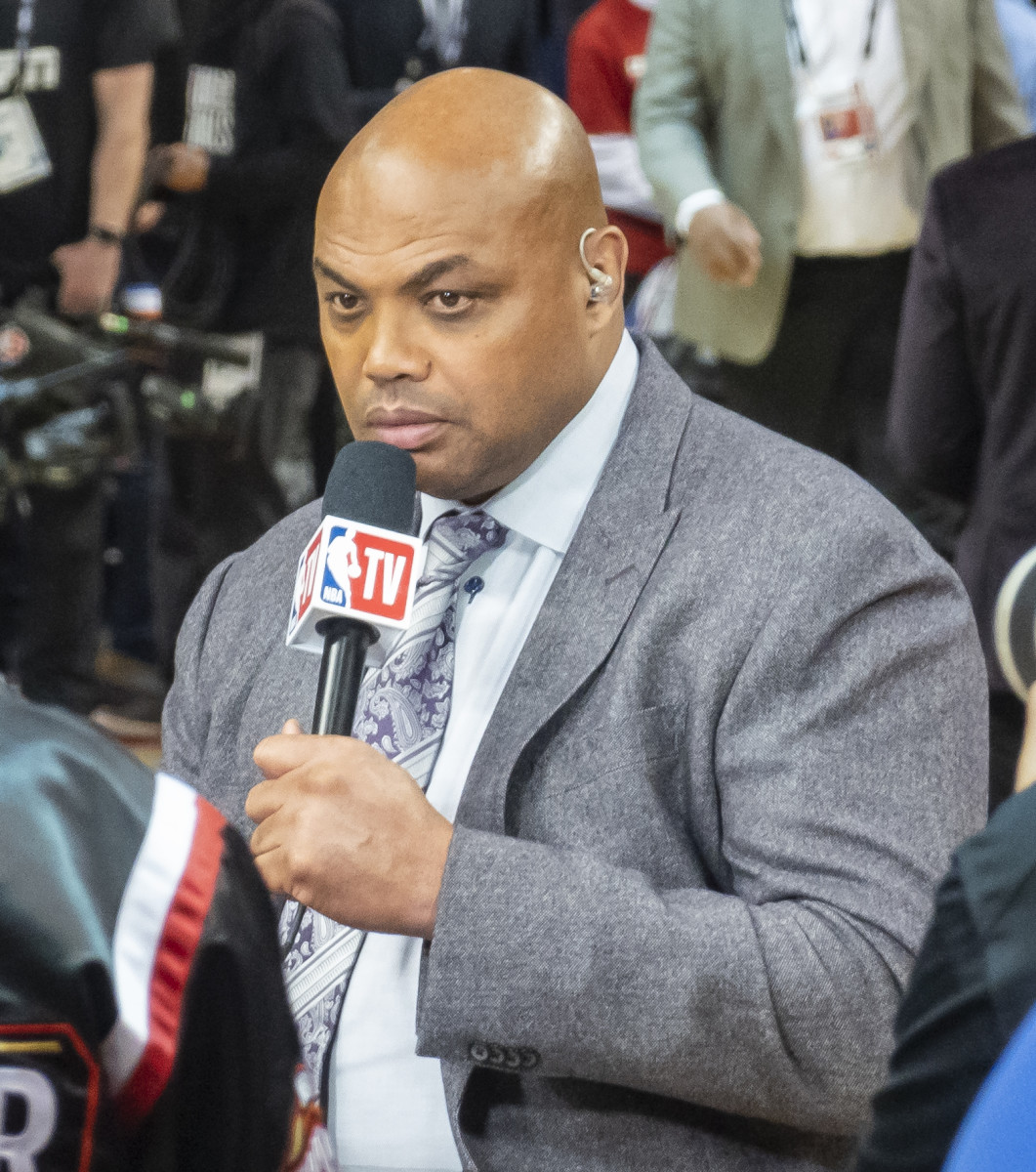 Charles Barkley courtside during a game.