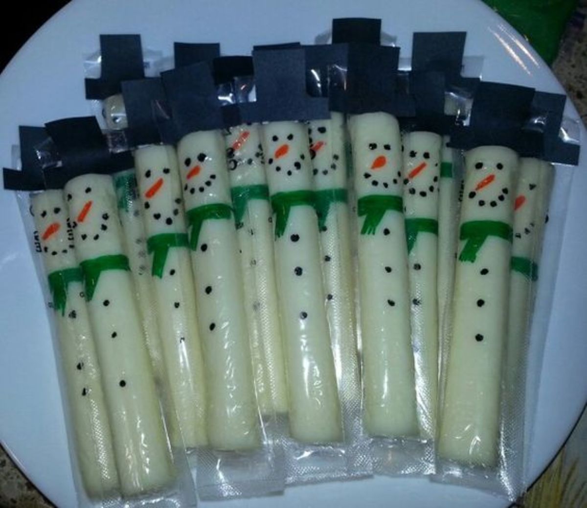 Cheese Snowman Sticks With Green Scarves