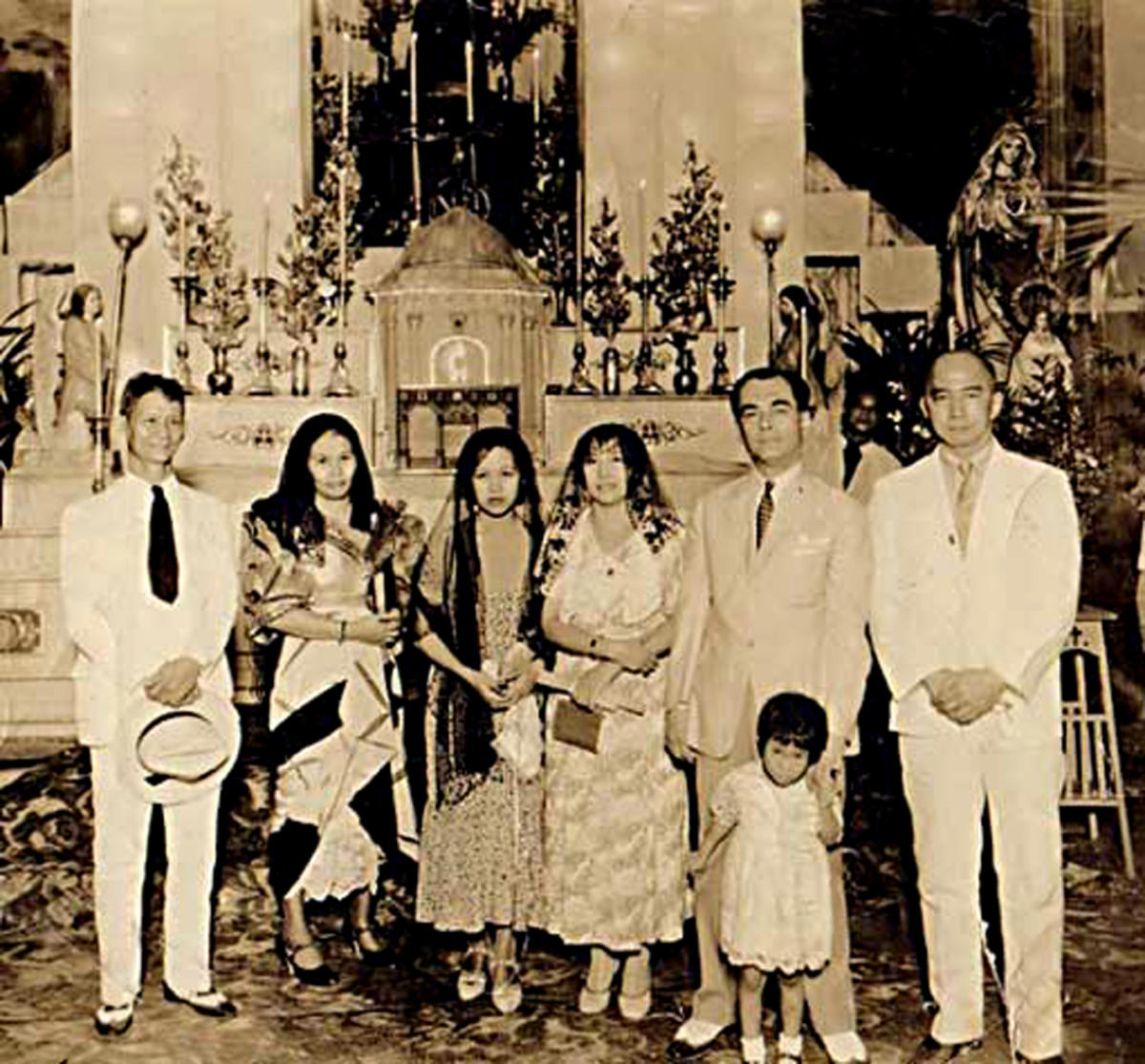 At the baptism of my aunt Aurora. President Quezon, second on right, was a school friend of my grandfather before he went into office.