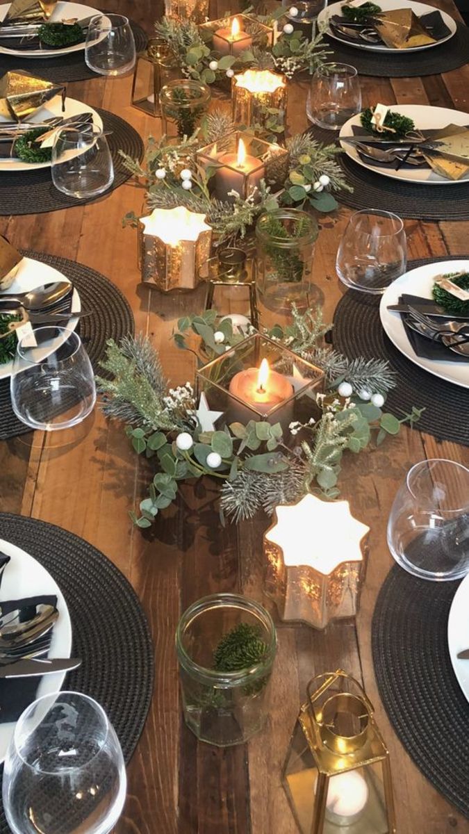 Surround elegant gold candles with Christmas greens.