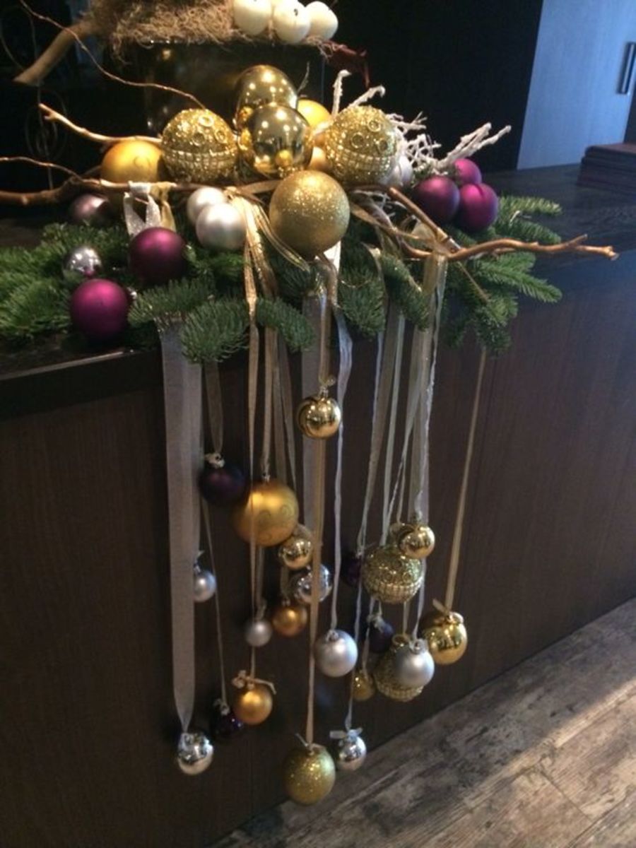 Hang some multicolored baubles from a shelf.