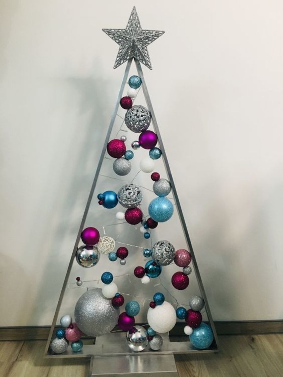 This silver and white tree incorporates unexpected shades of magenta and teal. It's striking!