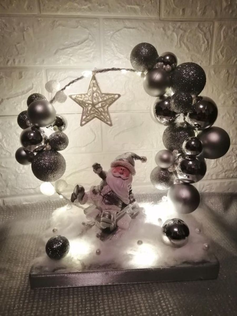 Silver Baubles With Santa Claus and String Lights