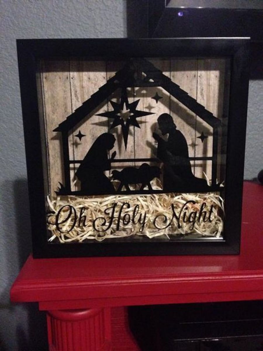 This shadow box features a nativity scene.