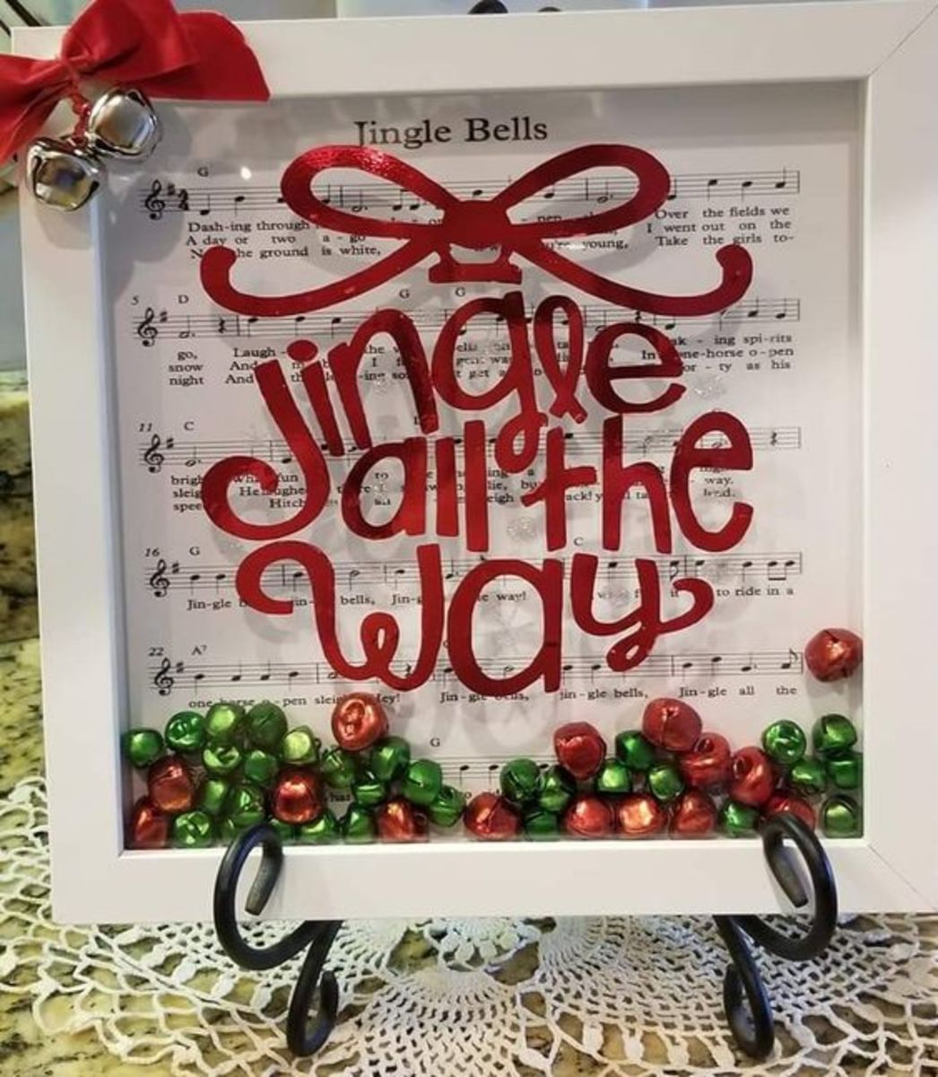 You can pair some Christmas song lyrics with a pile of baubles or other decorations in the box.