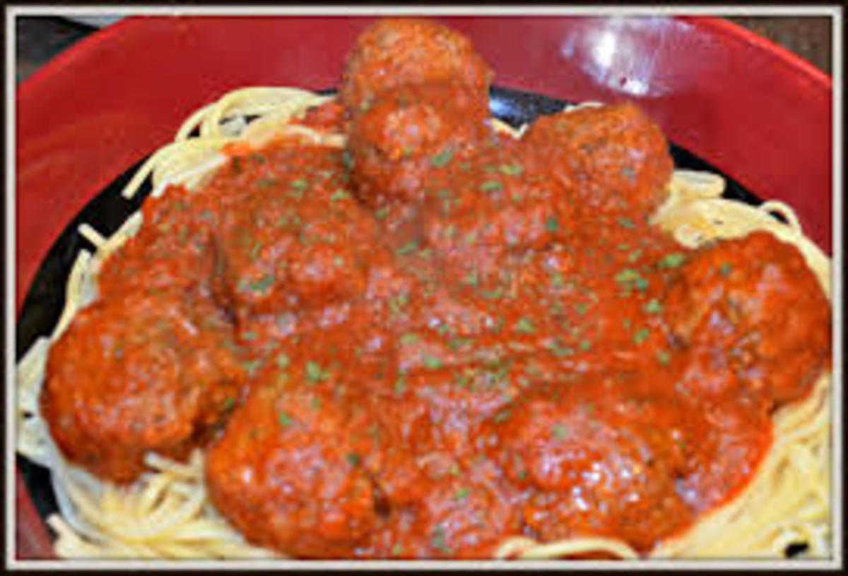 Italian meatballs over pasta.